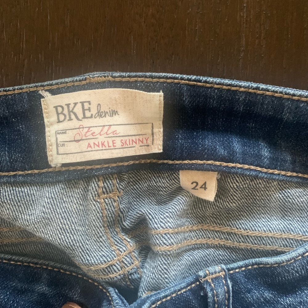 Buckle blue jeans